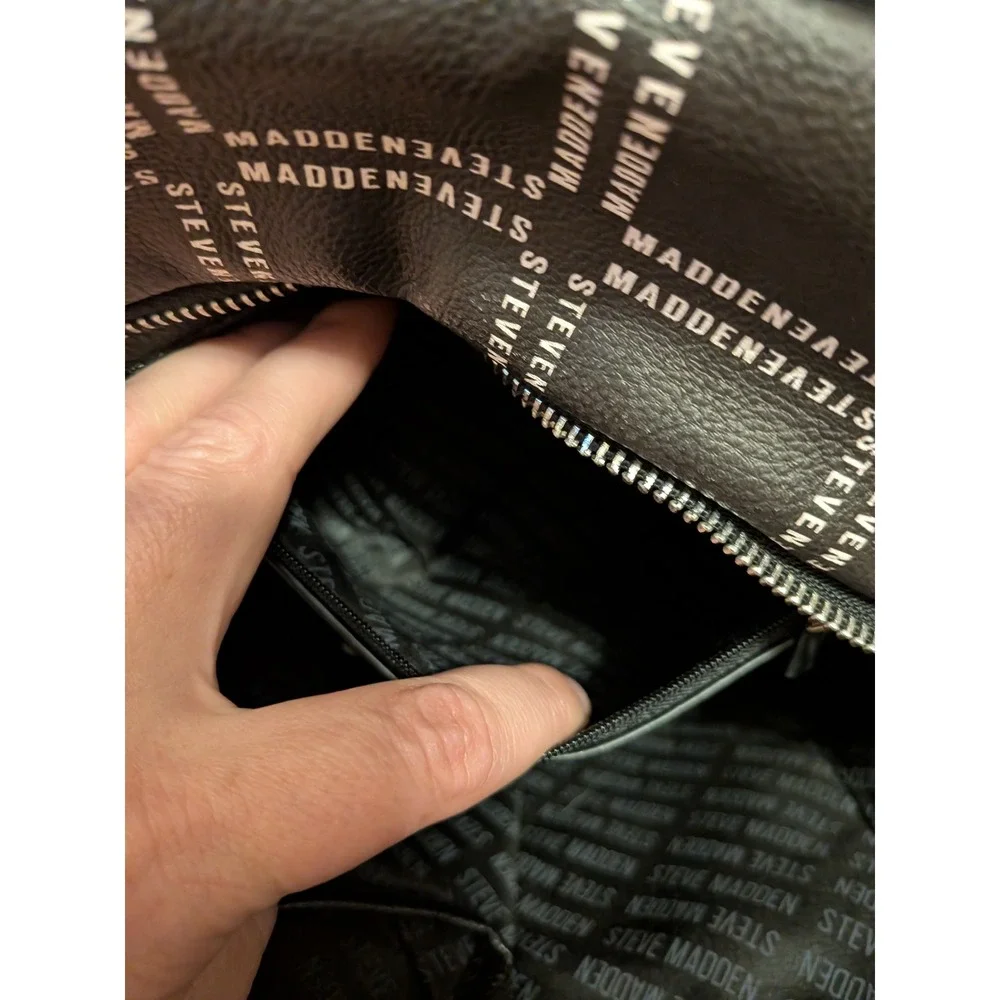 Steve Madden Black Logo Print Pebbled Leather Backpack Front Zip Pockets
